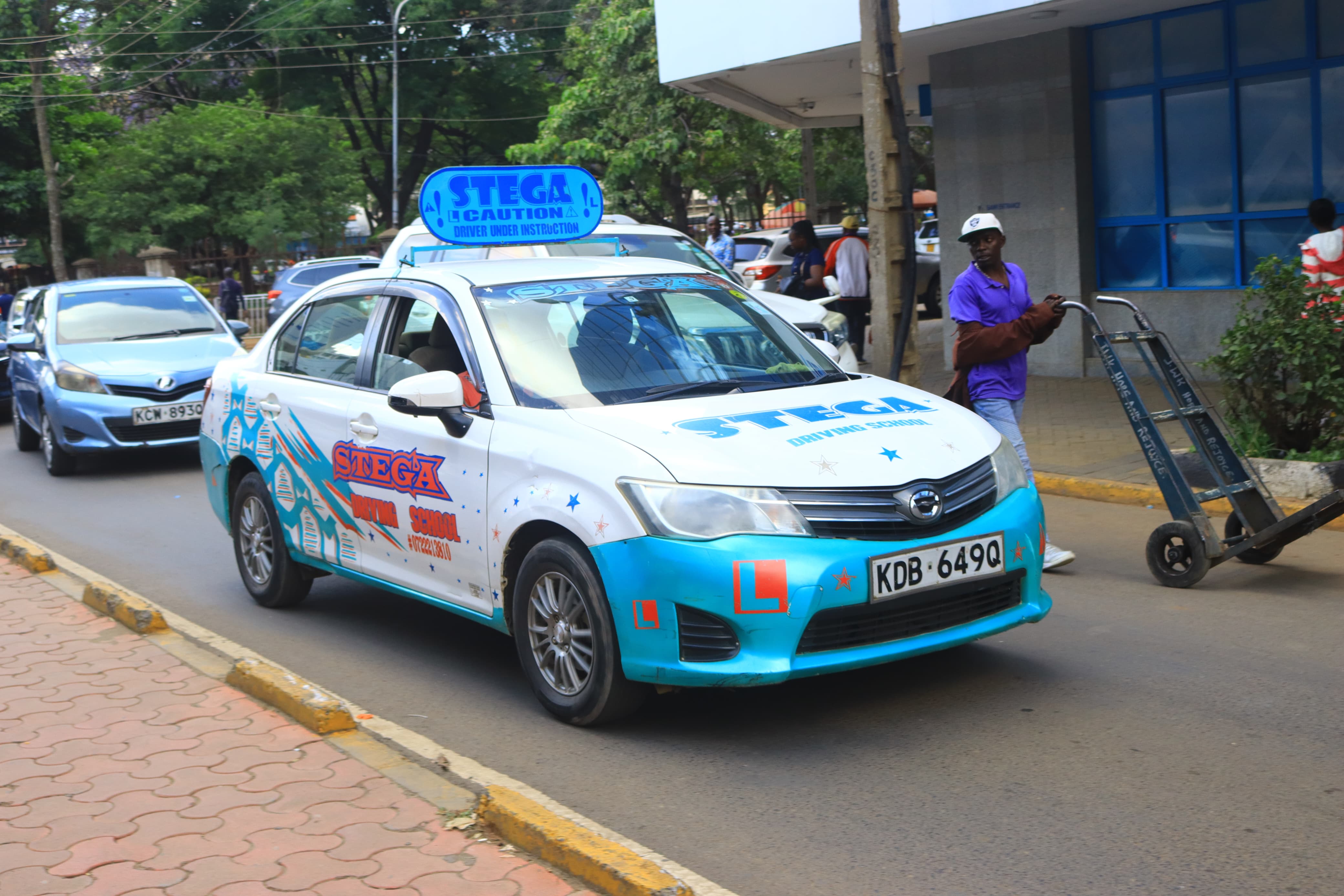 Stega Driving School branded training car on Nairobi streets